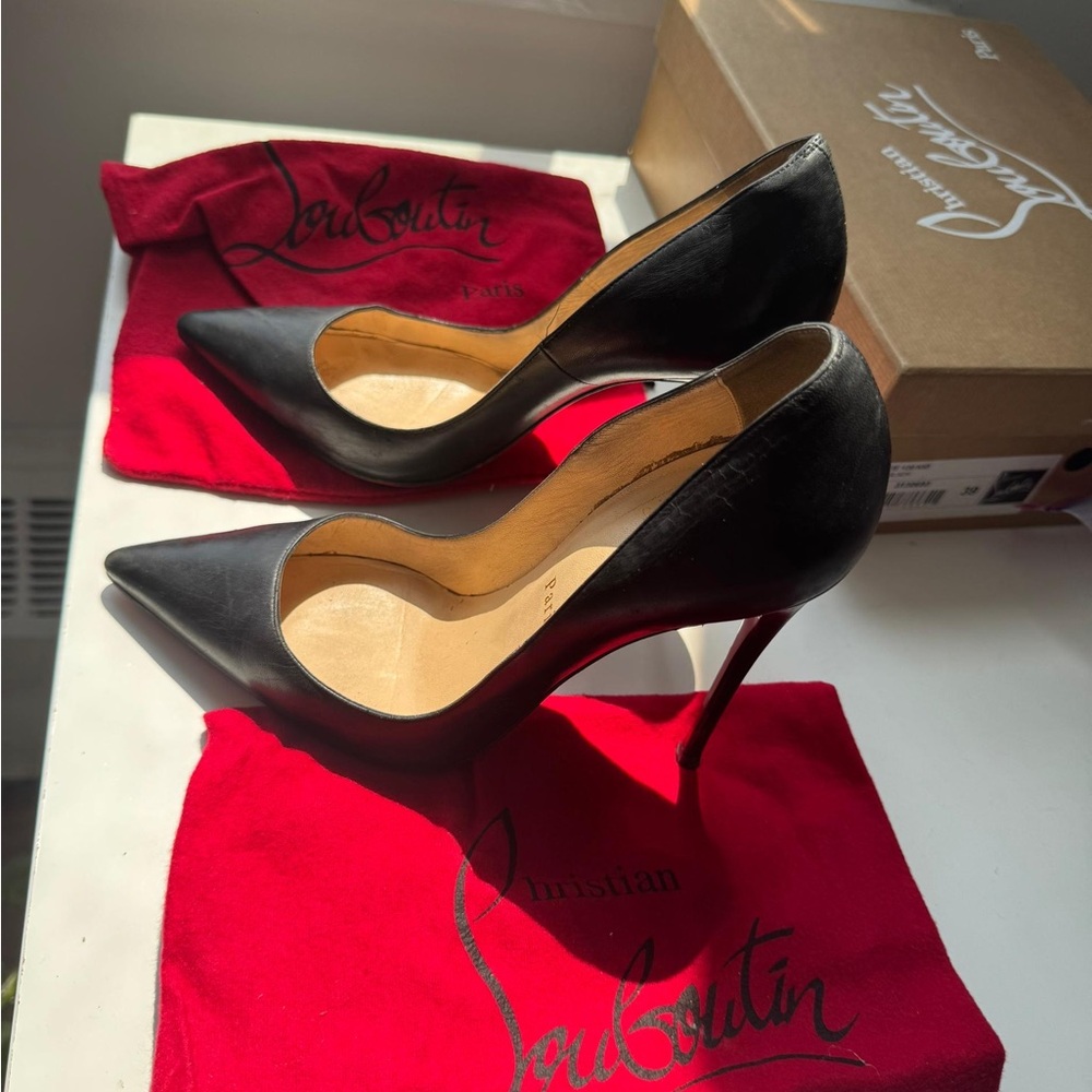 Christian Louboutin Elegant Black Heels with Red Sole